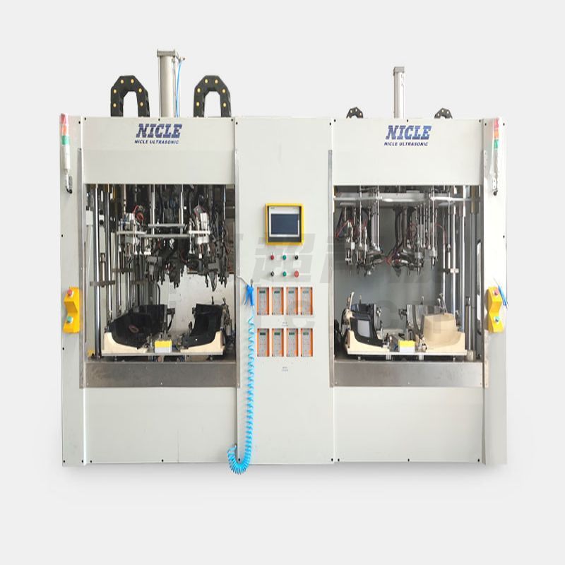 Double station hot riveting machine for automotive interior parts